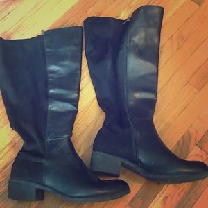Black wide width knee high boots.
